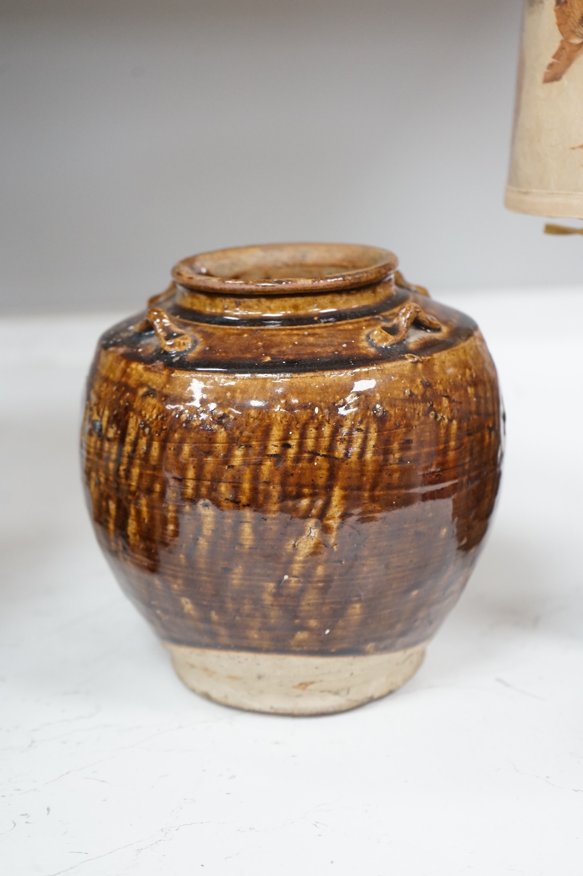 Two Chinese glazed pots, one converted as a lamp with a pressed floral shade, largest overall 37cm high